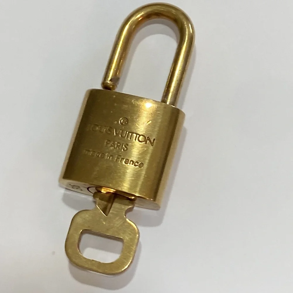 #316 LV lock key March 16 Louis Vuitton gold tone brass Anniversary Birthday